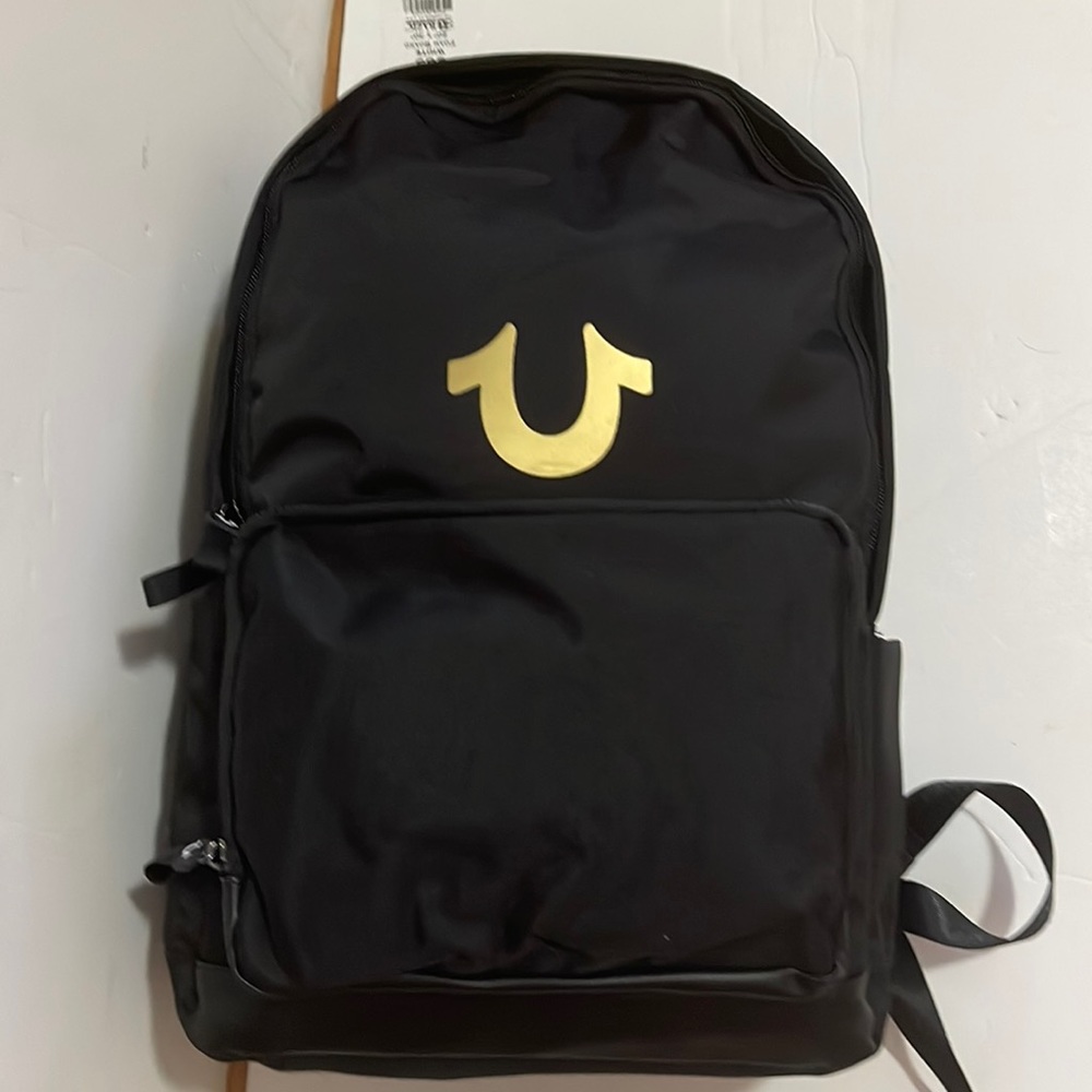 TRUE RELIGION black logo gold backpack